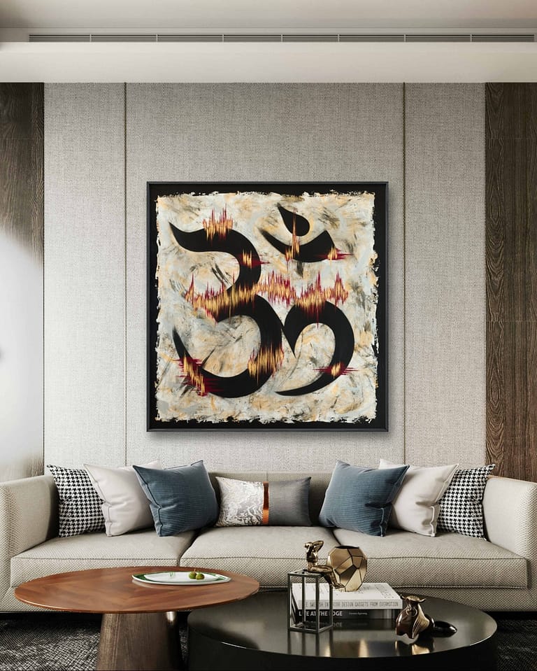 Luxury modern living room featuring Tune In, the Om vibrational painting by Reykjavík artist Andrea Ólafs, hung above gray sofa with neutral tones and metallic accents.
